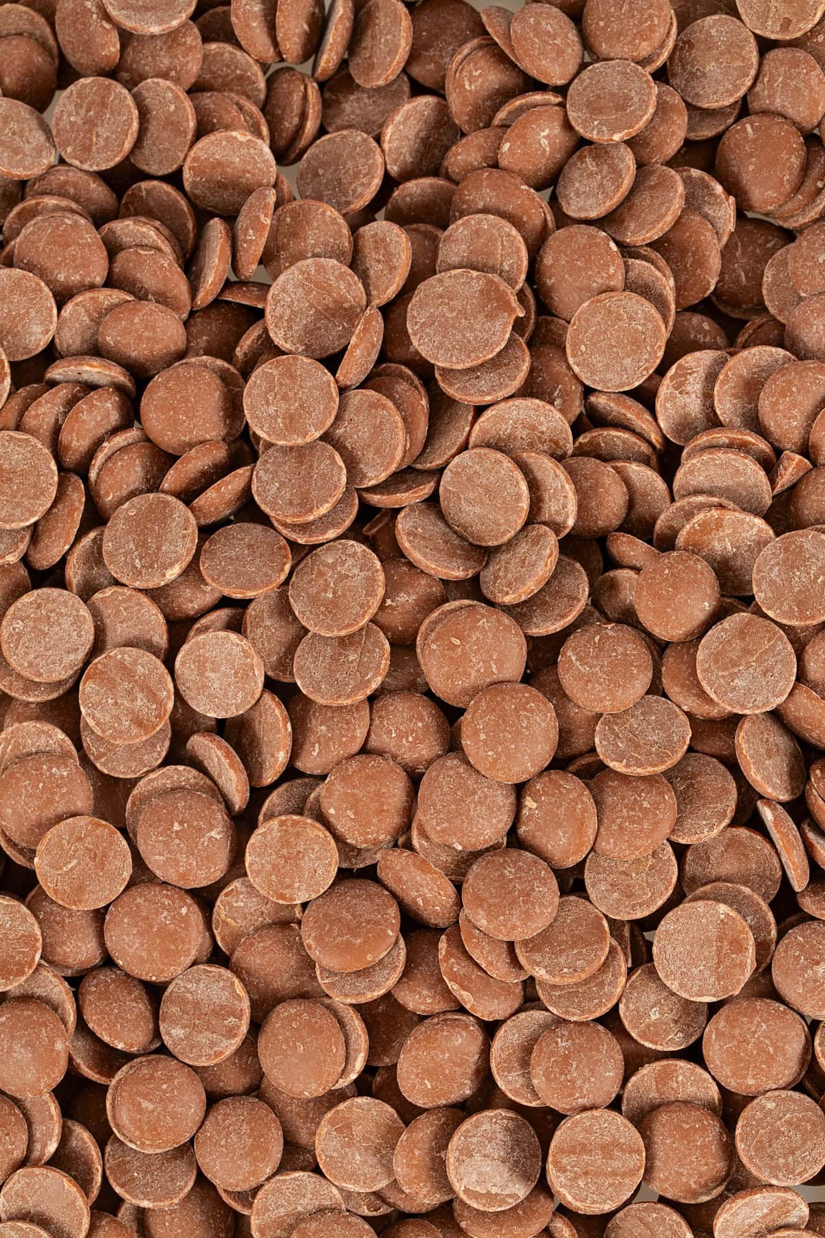 A pile of chocolate melting wafers.