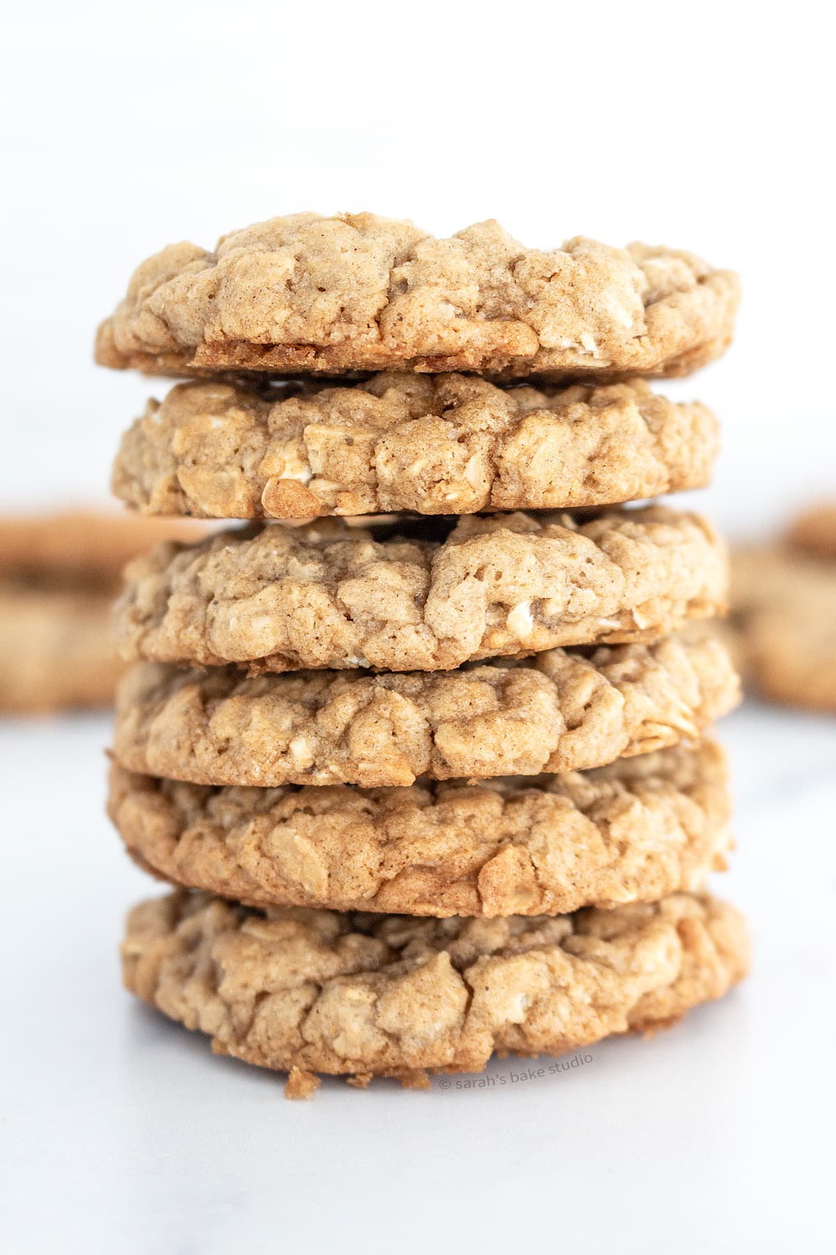 A stacked tower of Classic Oatmeal Cookies.