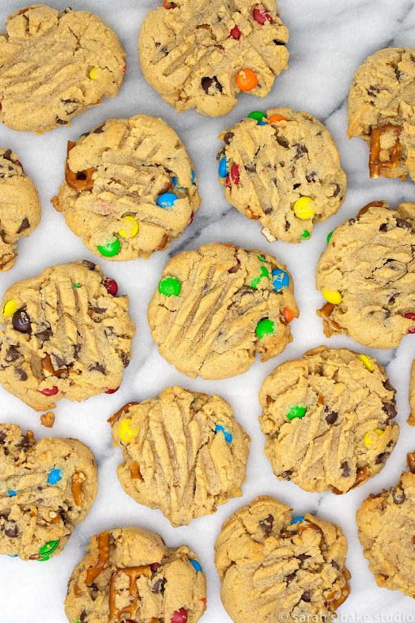 Loaded Peanut Butter Pretzel Cookies - soft, super duper peanut butter cookies loaded with crunchy pretzel pieces, mini chocolate chips and colorful mini M&M's candies; a scrumptious sweet and salty cookie delight.