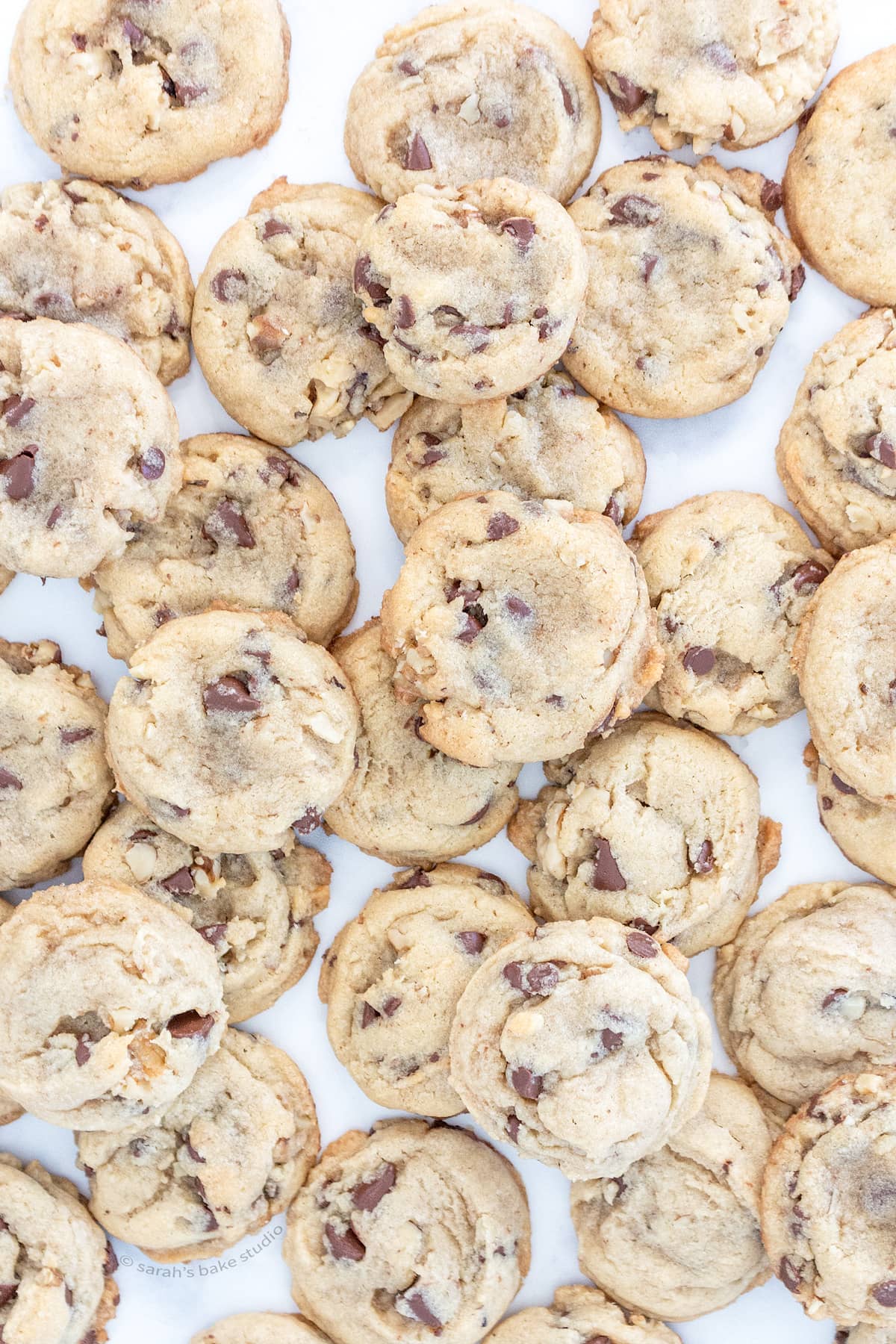 A pile of BEST Chocolate Chip Cookies.