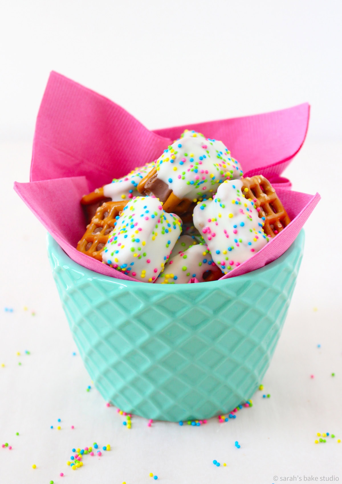 A glass bowl filled with Milky Way Pretzel Bites.