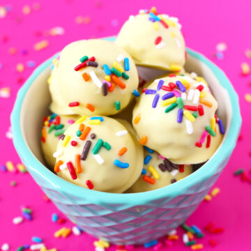 A bowl filled with Birthday Cake Oreo Truffles.
