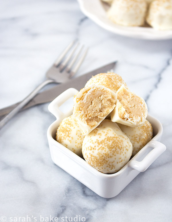 Golden Oreo Truffles – crushed Golden Oreo cookies mixed with cream cheese, scooped, and dipped into beautiful melted Ghirardelli white chocolate; pure Oreo truffle bliss.