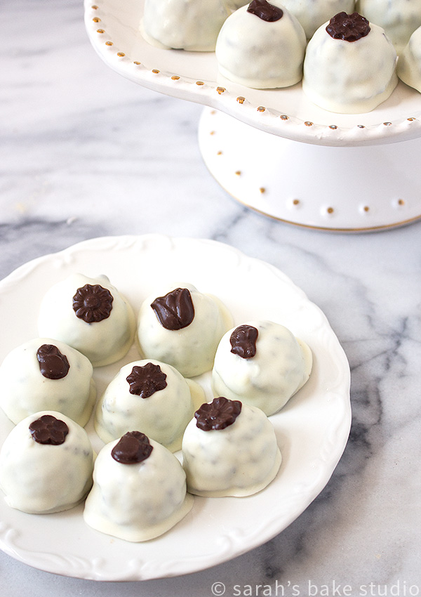 Tuxedo Oreo Truffles – your favorite Oreo Truffles, crushed Oreo cookies blended with cream cheese, decorated with black and white chocolate, and given a fun and fancy name.
