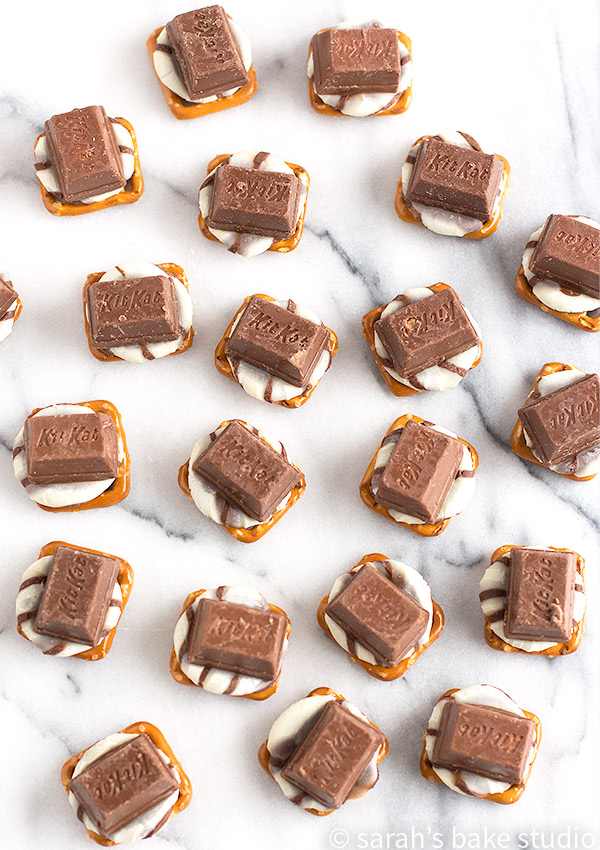Kit Kat Pretzel Bites – crunchy pretzel snaps, sweet Hershey’s Hugs, and chocolate-y Kit Kat Minis make this easy-peasy, sweet and salty treat out of this world delicious!