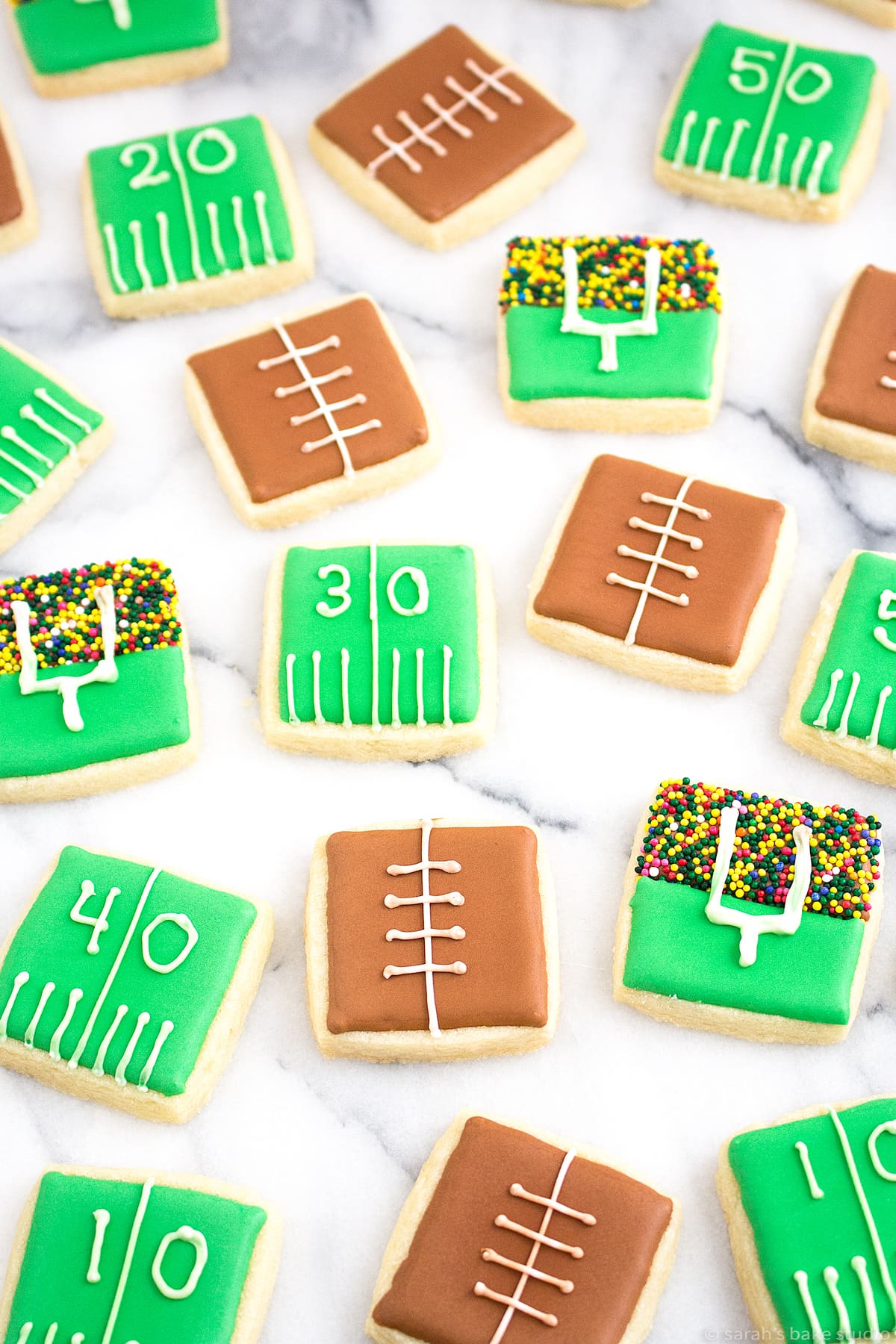 a flatlay of football game day sugar cookies.