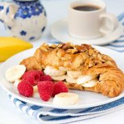 sticky banana croissants with crushed nuts