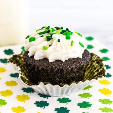 A Green Velvet Cupcake slightly out of its wrapper.
