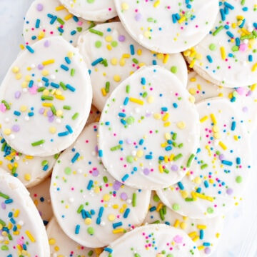 A stacked pile of White Chocolate Easter Egg Sugar Cookies.