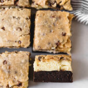 Brownie Bottom Cookie Dough Cheesecake Bars from Handle the Heat.